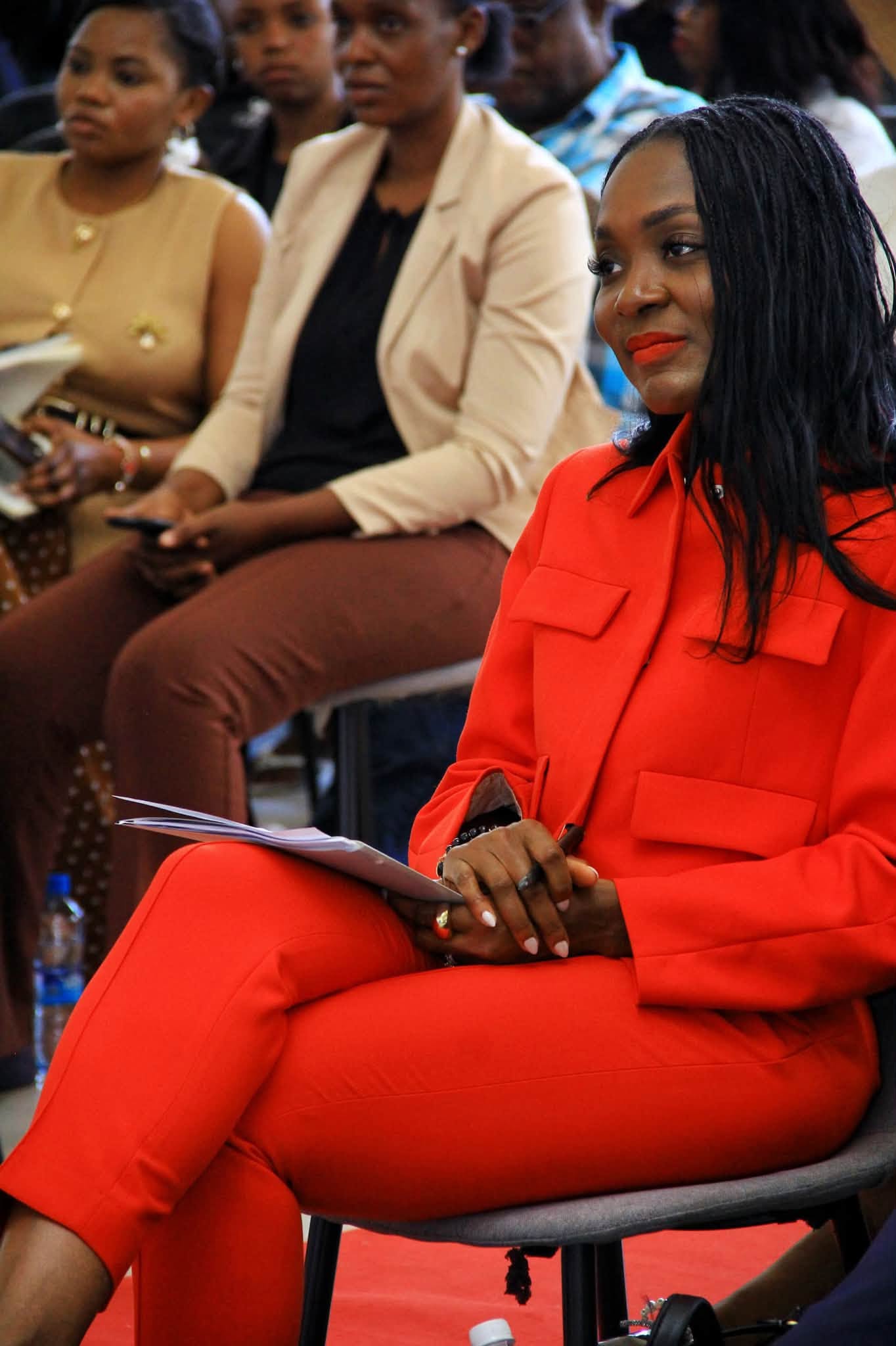Dr. W.E. Da'Cruz listening during the conference
